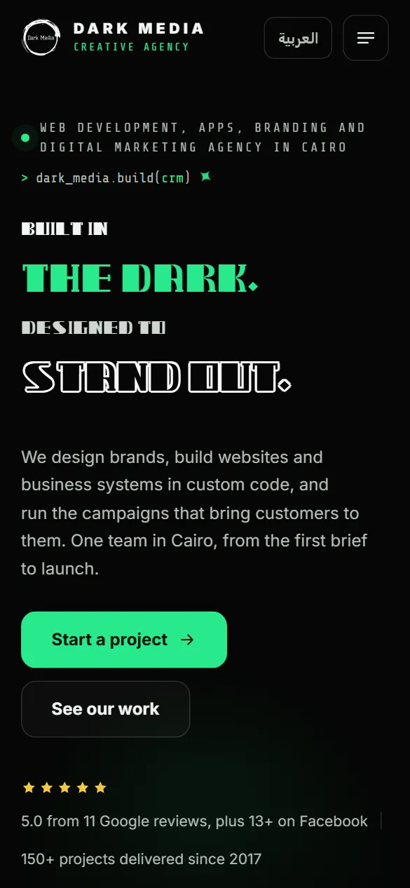 Minimal dark portfolio homepage on a mobile phone